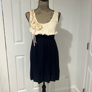 Mine Dress absolutely flattering size L fits like a S.  Off white and Navy